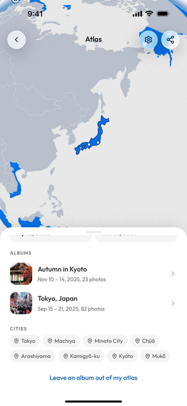 The same sheet scrolled down: the albums Autumn in Kyoto, 23 photos, and Tokyo, Japan, 82 photos, the cities Tokyo, Machiya, Minato City, Chūō, Arashiyama, Kamigyō-ku, Kyoto and Mukō, and the link Leave an album out of my atlas