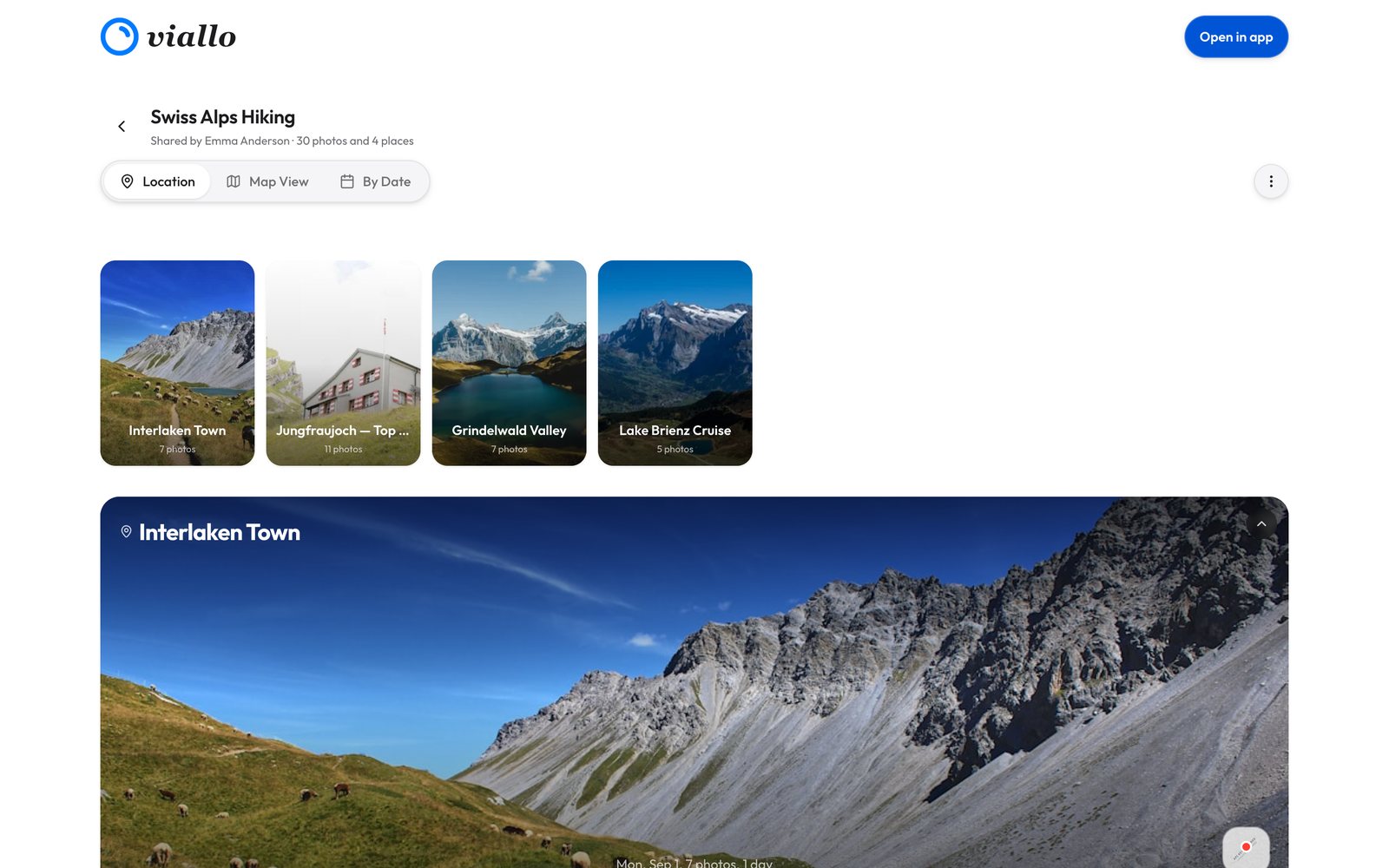 The demo album Swiss Alps Hiking opened from its view-only link on a computer, signed out: the line Shared by Emma Anderson, 30 photos and 4 places, an Open in app button, the switch Location, Map View and By Date, place cards for Interlaken Town, Jungfraujoch, Grindelwald Valley and Lake Brienz Cruise, then the Interlaken Town section and its photo grid