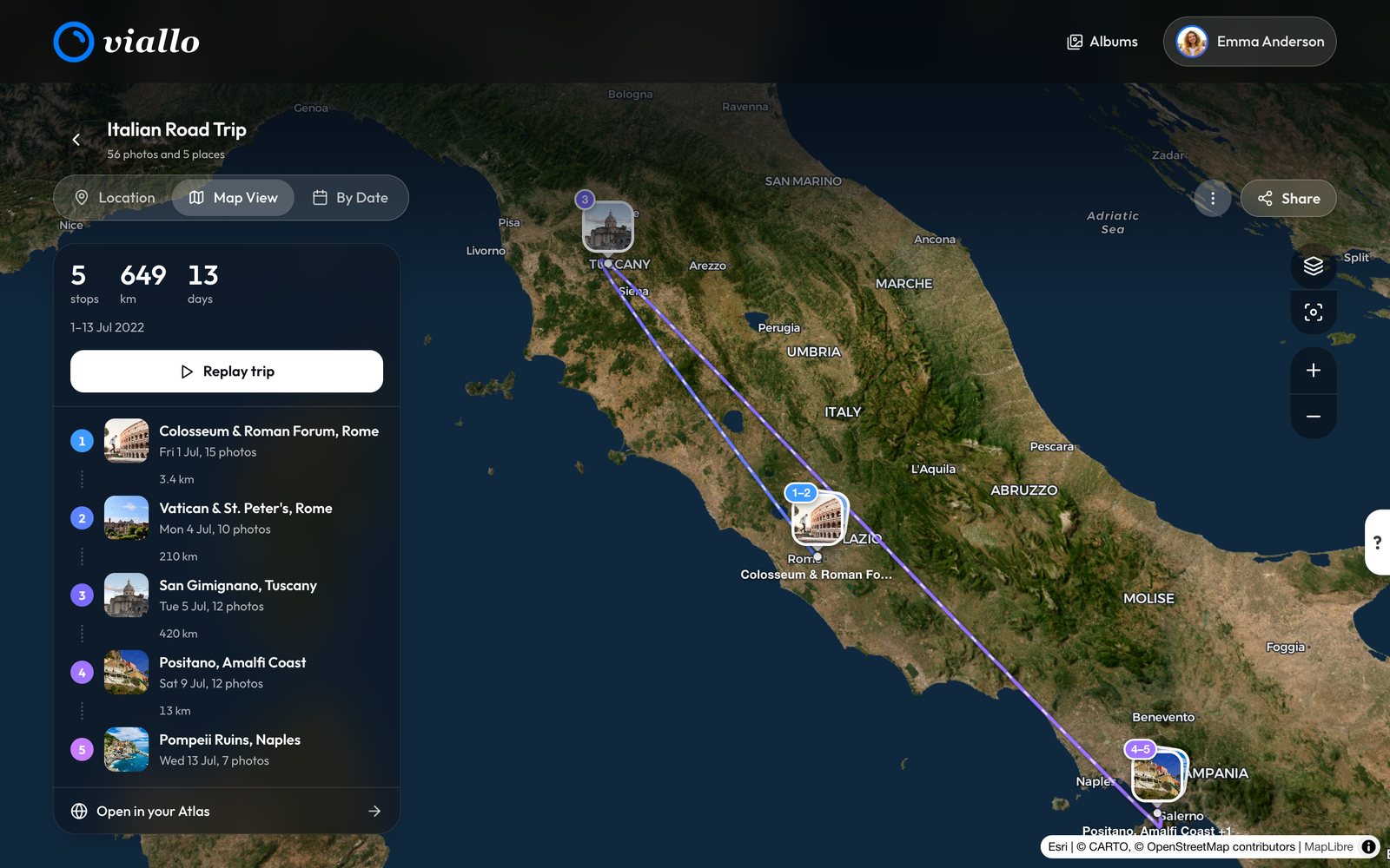 Desktop Map View of the demo album Italian Road Trip on satellite imagery of Italy: numbered photo pins for its stops, with the two Rome stops merged into one pin marked 1-2, stop 3 in Tuscany and stops 4-5 near Naples, joined by a route that shades from blue to violet; on the left a trip panel reading 5 stops, 649 km, 13 days and 1-13 Jul 2022, a Replay trip button and the five stops from Colosseum & Roman Forum to Pompeii Ruins with their dates, photo counts and the distance between them; map layer and zoom buttons on the right